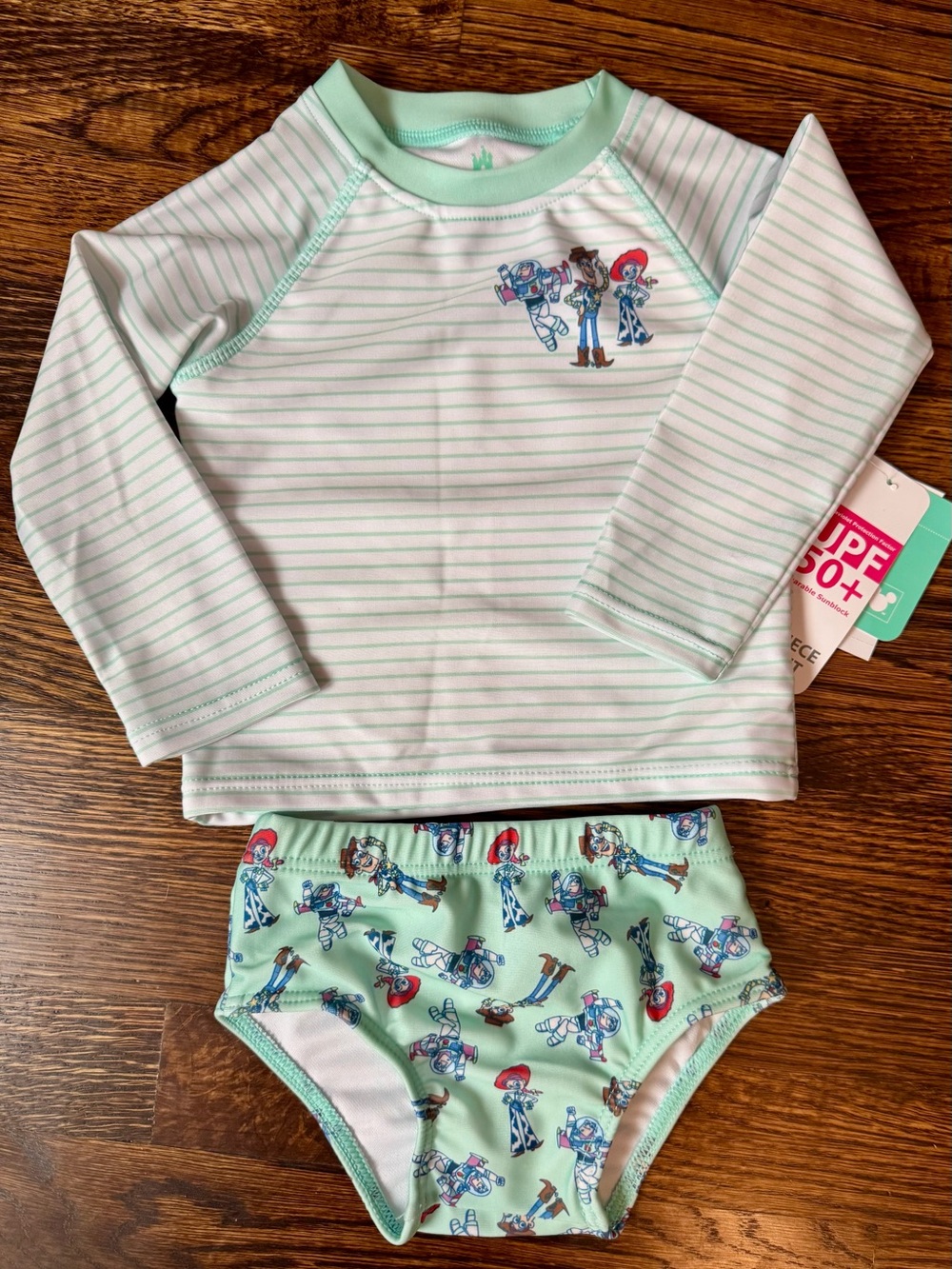 Disney Baby Green and White Striped Swimsuit with Toy Story Characters- 12 Month